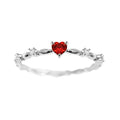 Gold or silver electroplated copper ring with a peach heart shape set with zircon stones.