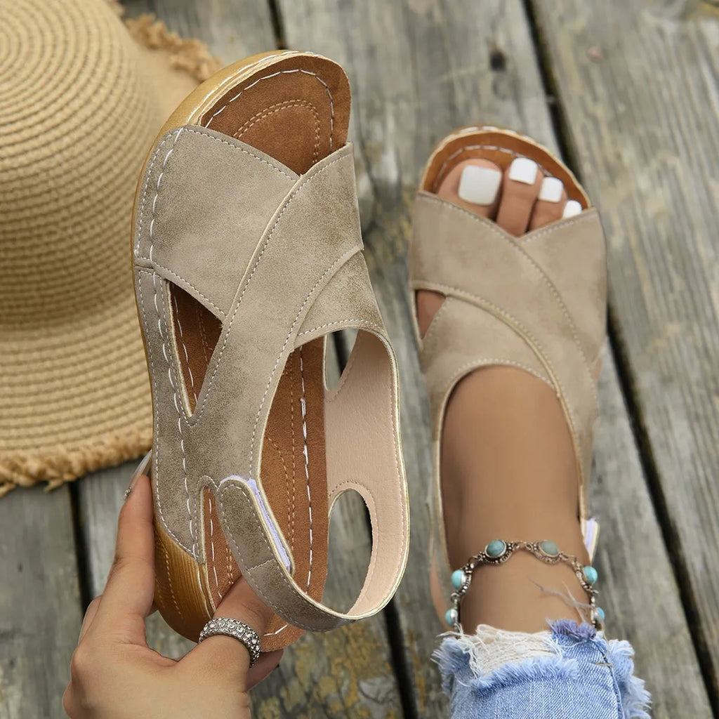 Roman platform sandals with skirt detail and Velcro fastening in neutral colours