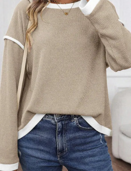 Loose-fitting drop shoulder knit top with Four Leaf Clover pattern contrast trim in beige colour