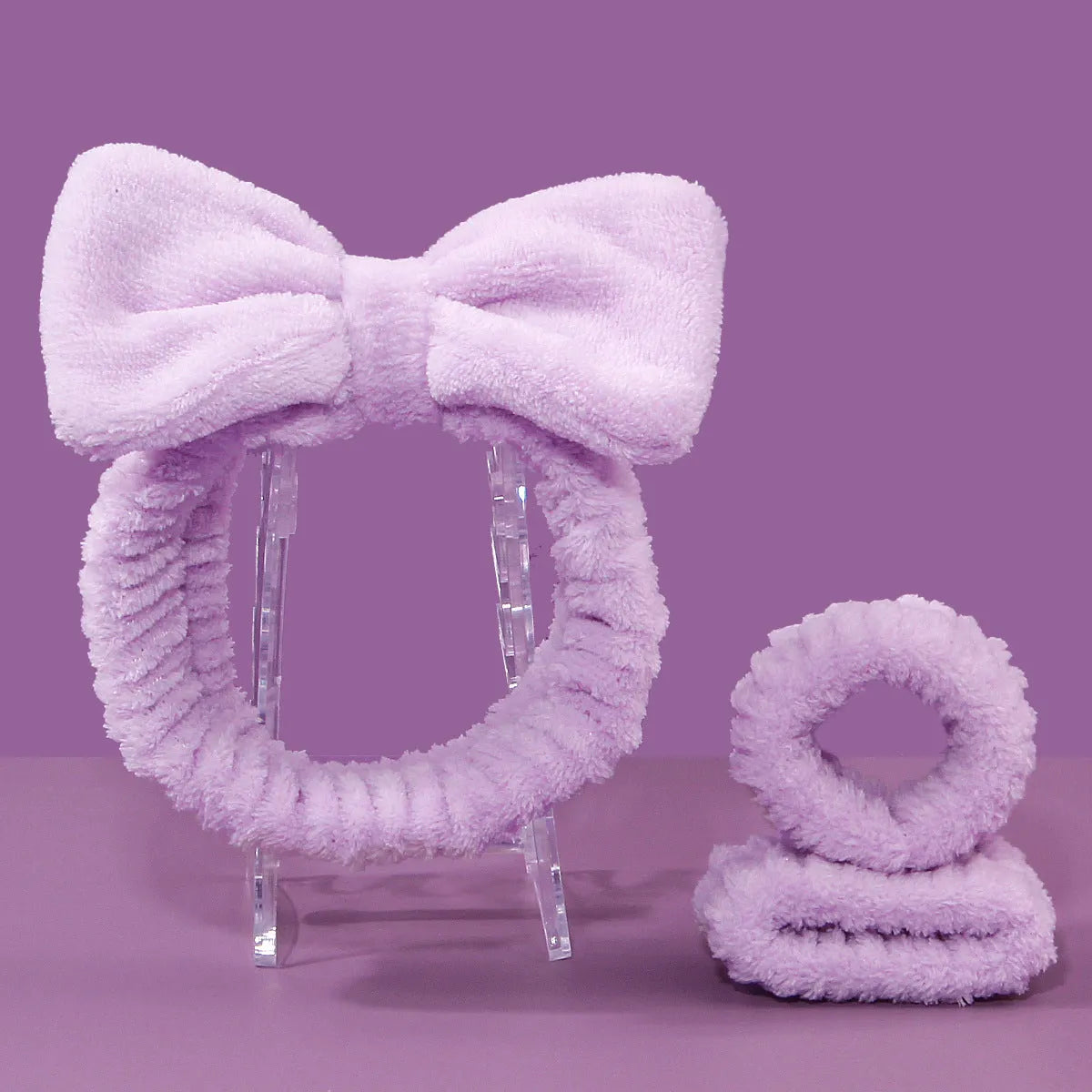 Facial brush set with coral fleece hair band, nylon bristle brush, and plastic toothbrush in purple, grey, white, or pink colours