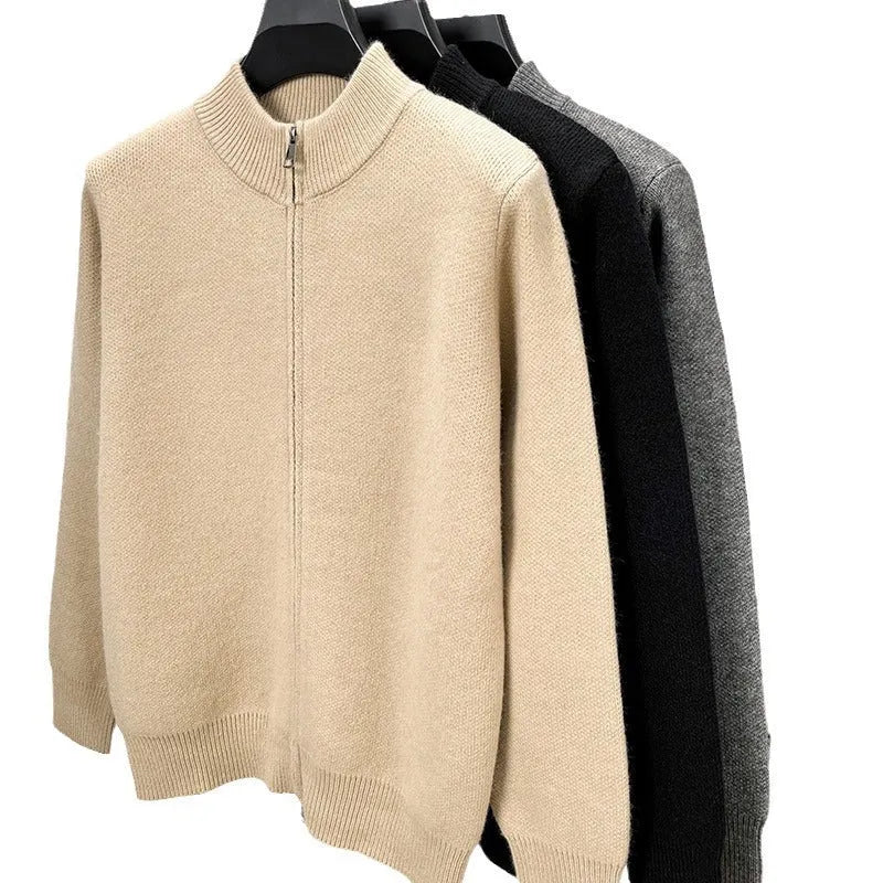 Men's black zip-up knitted cardigan with a stand collar on a hanger