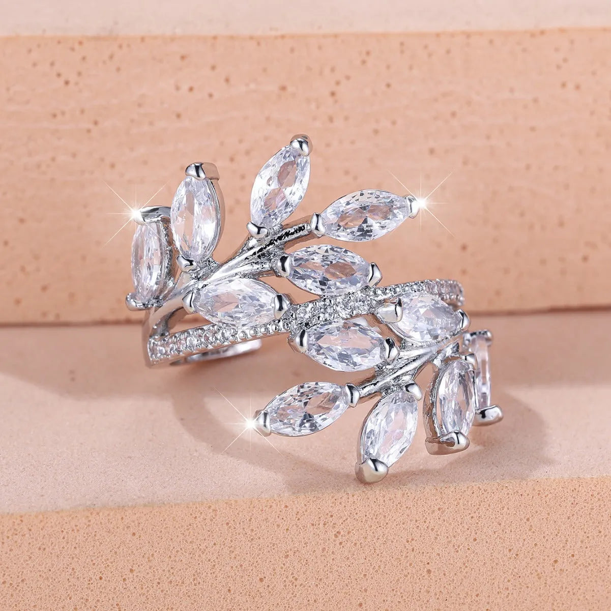 Adjustable copper leaf ring with a horse eye zircon stone in a choice of nine colour finishes.
