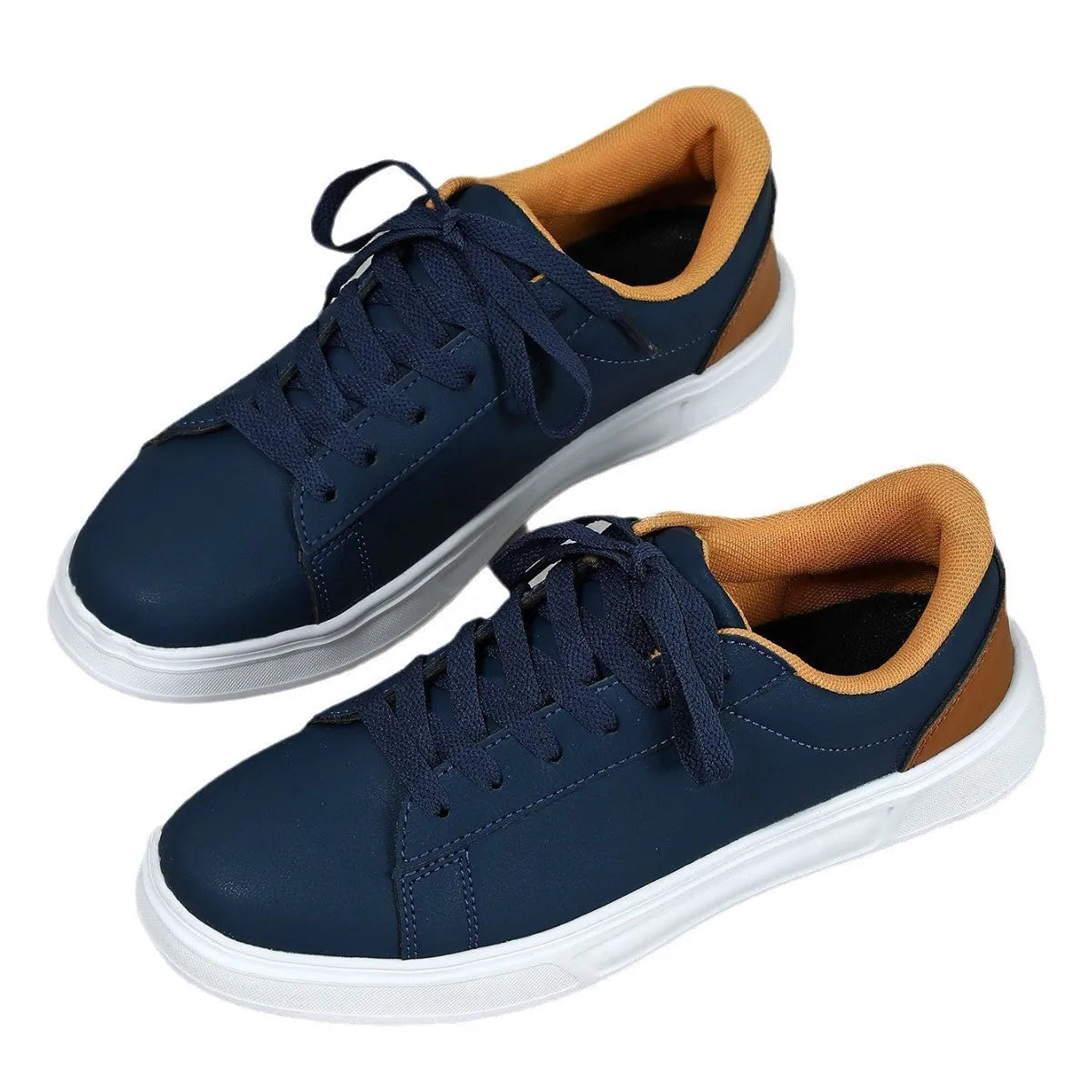 Women's beige brown platform skate sneakers with cross-strap detail and chunky rubber sole.