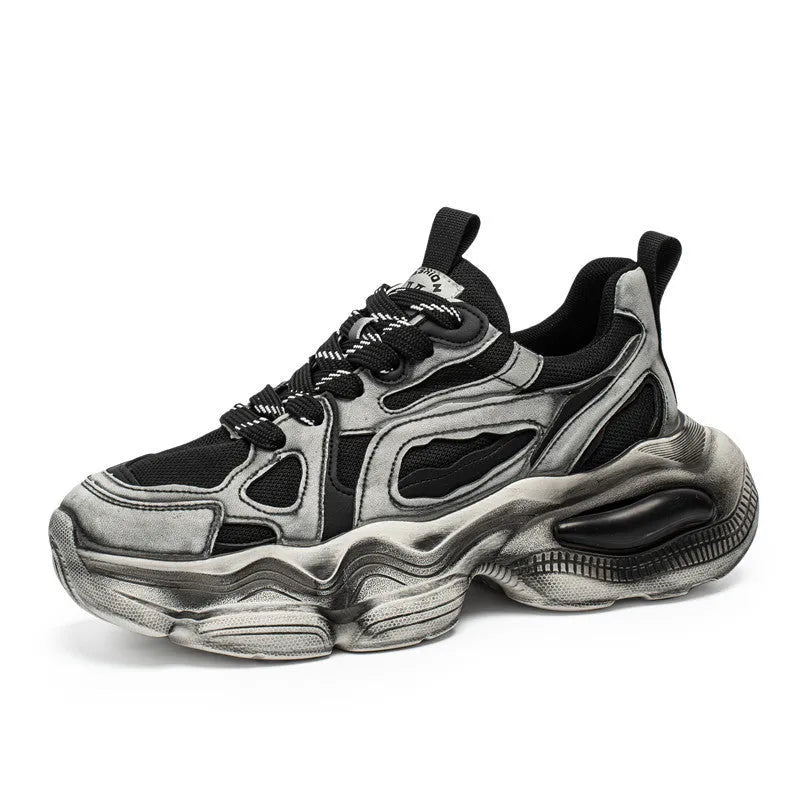 Men's black mesh sneakers with a platform sole and lace-up front on a white background.