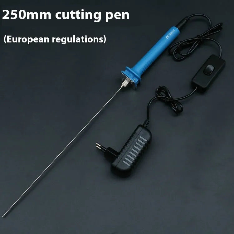 Blue plastic-handled electric foam cutter pen with adapter on a work surface.