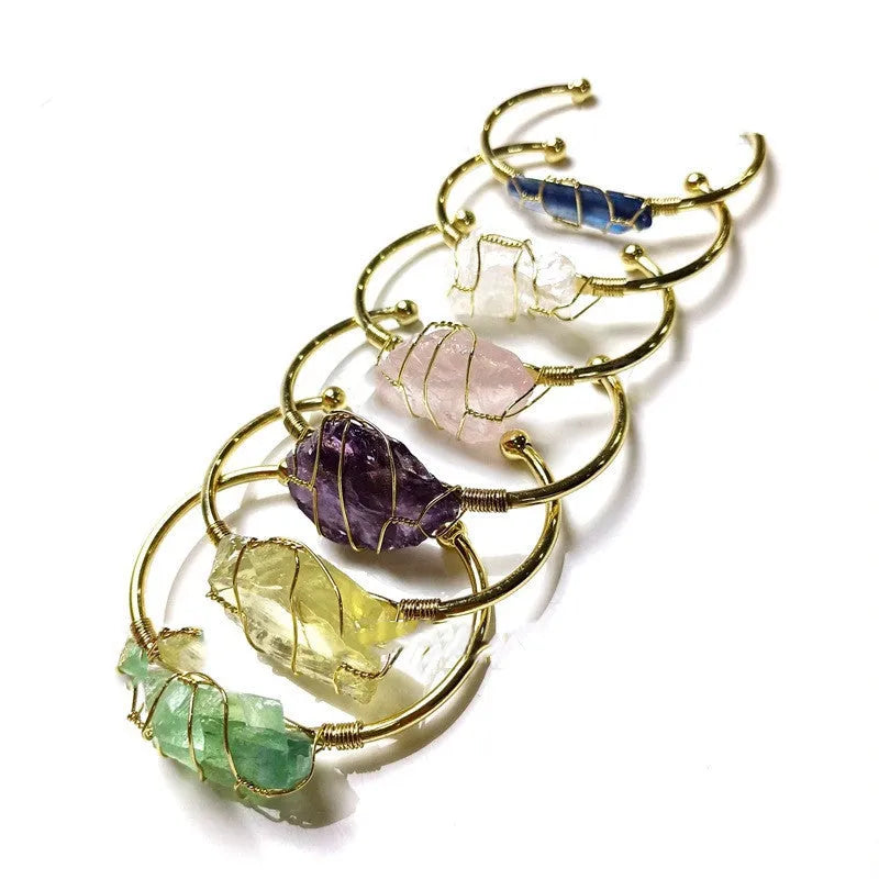 Unshaped natural crystal bracelet with gold winding wire geometric design