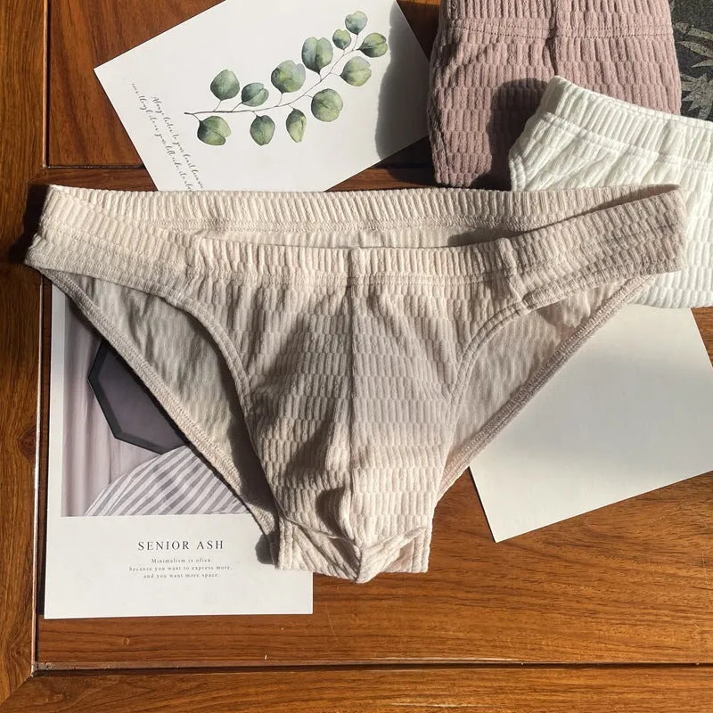 Men's cotton briefs in solid colours showing mid waist and triangle design