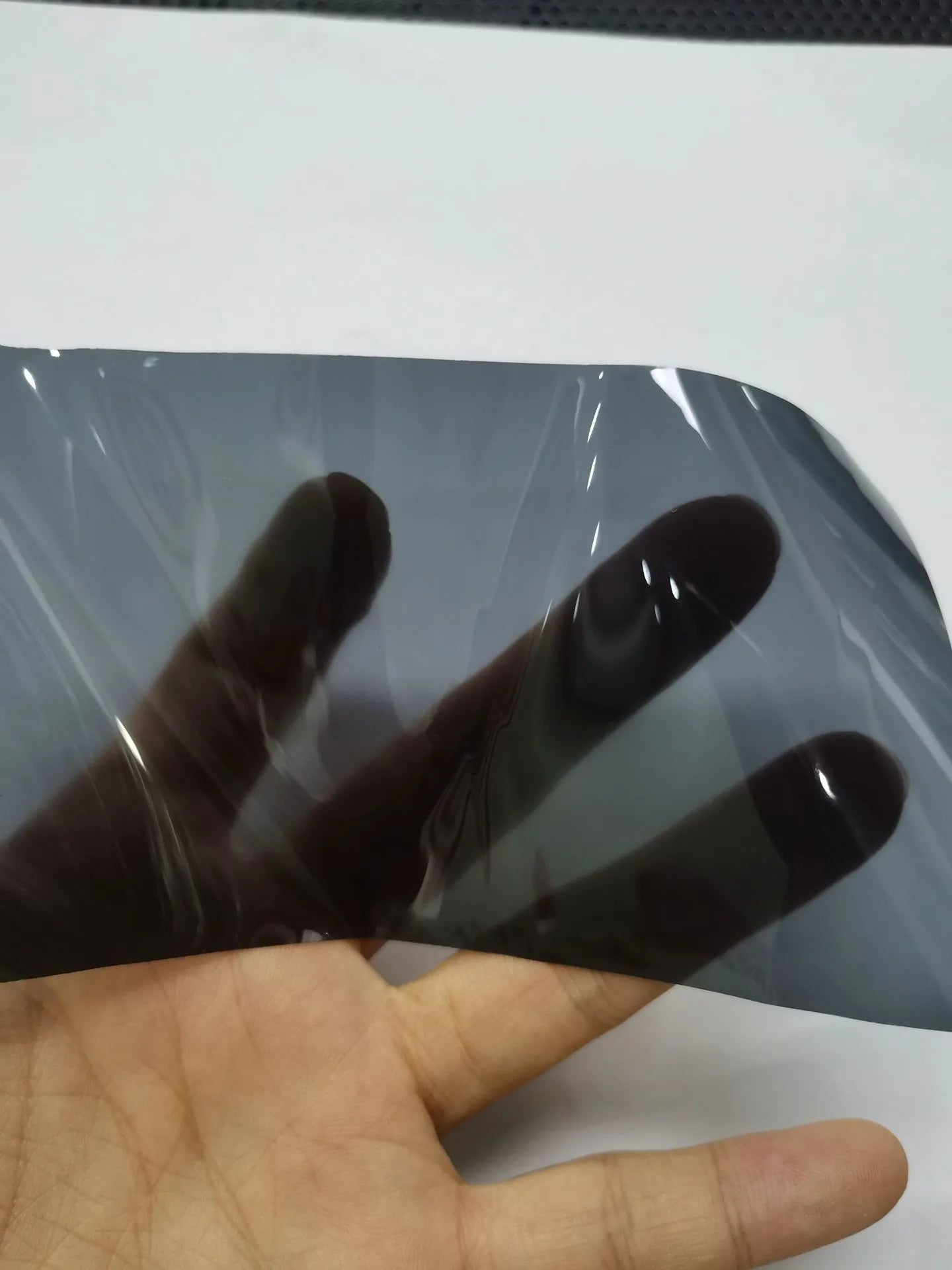 30cm wide plastic car lamp protective film on LED headlight showing transparent protection