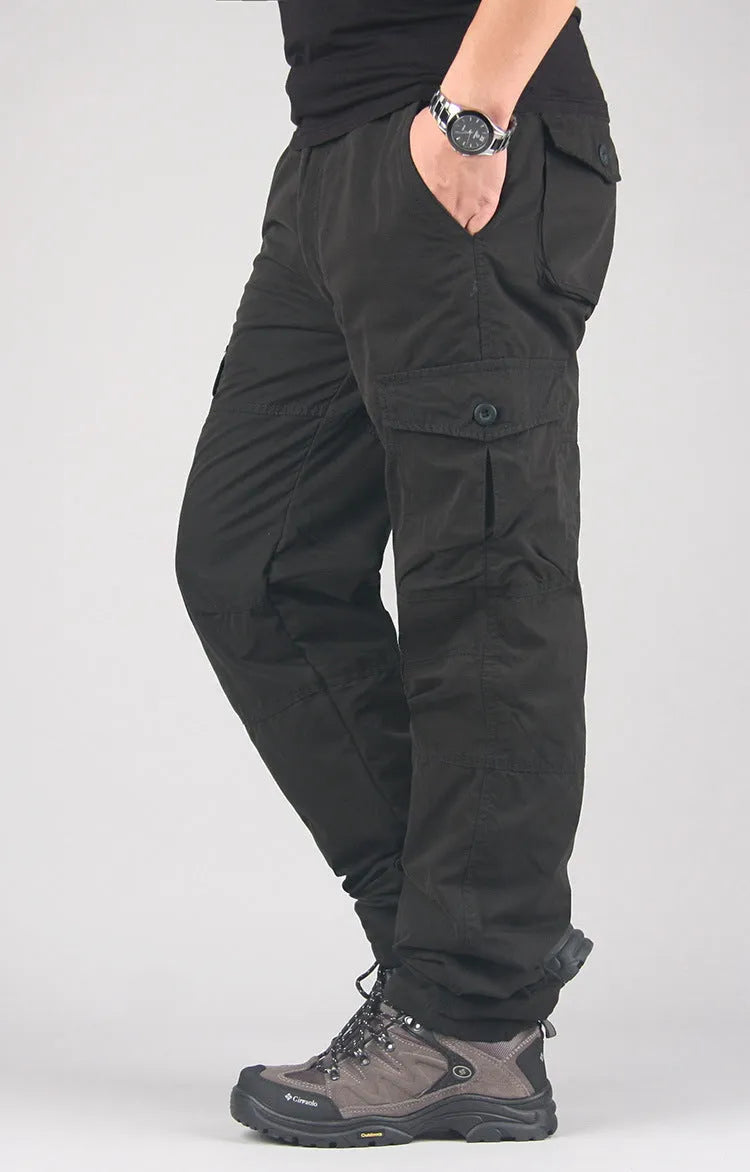 Men's thickened velvet overalls with wool lining in khaki colour, showing loose fit and straight leg style.