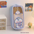 Large transparent PVC pencil case with cartoon bear, rabbit, and dog designs for student stationery.
