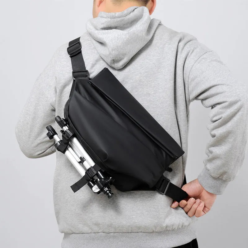 Grey PU leather crossbody bag showing internal phone pocket and document sleeve organisation