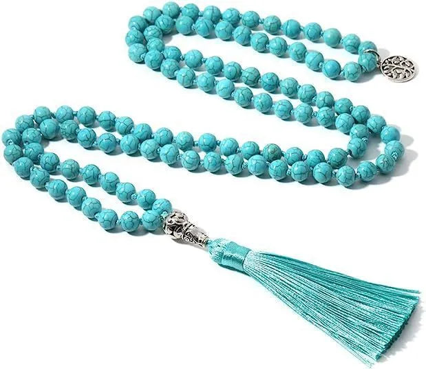 Handmade knotted beaded necklace with stone pendant showing 108 beads and geometric design