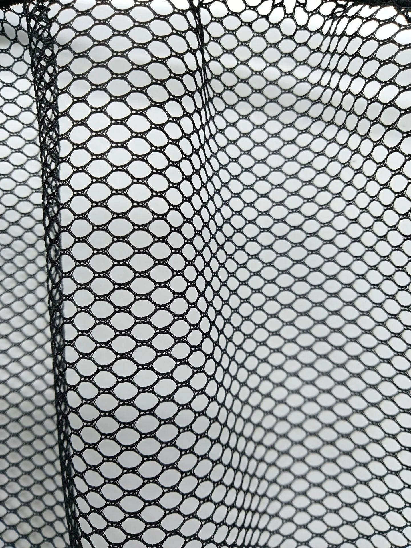 Black elastic polyester storage net for securing items in a car boot, shown in 20x35cm and 20x45cm sizes.