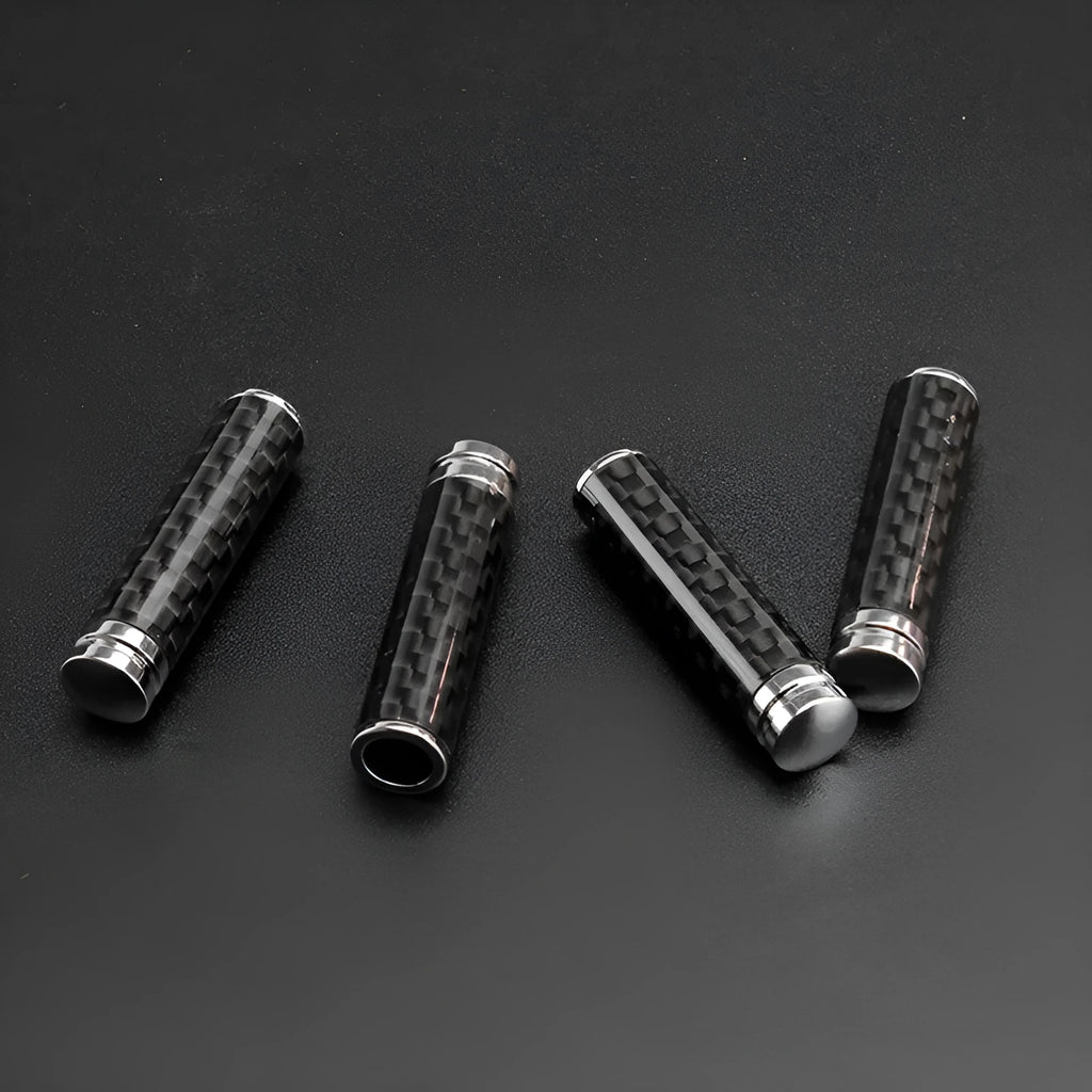 Four carbon fibre and metal car door handle decorative covers for direct replacement installation.