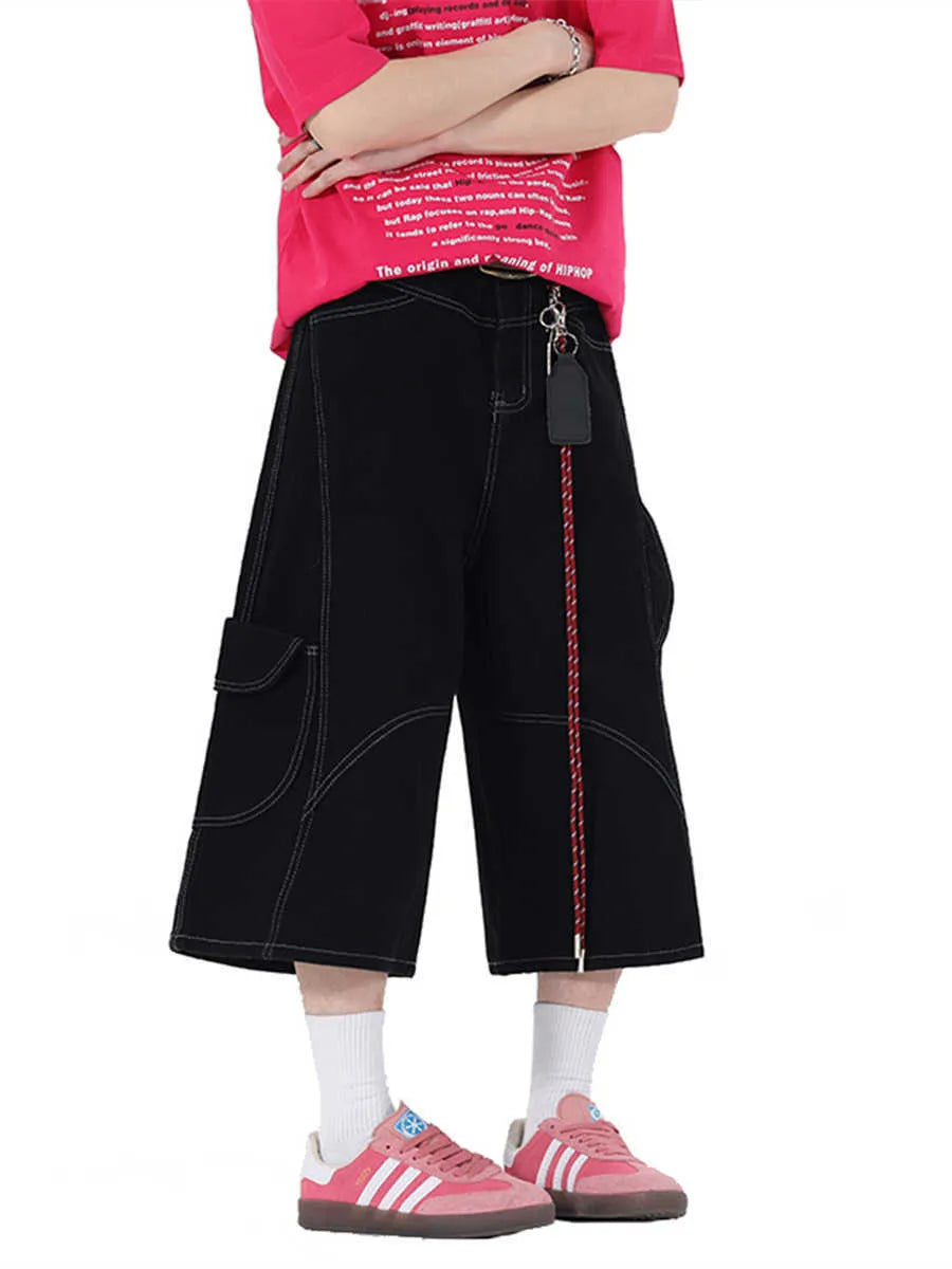 Retro denim workwear shorts with wide leg cut and multiple pockets in red colour