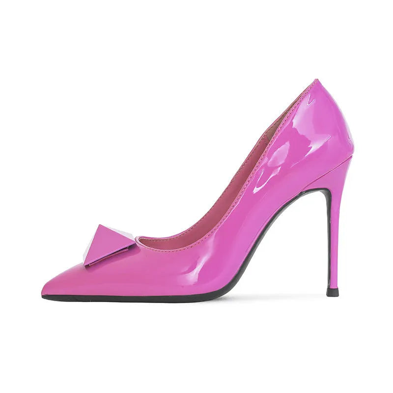 Women's pink pointed toe stiletto high heels with patent leather uppers and ankle buckle detail