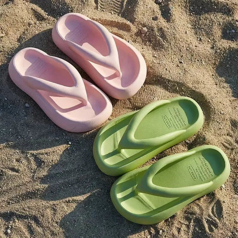 Women's thick-soled EVA flip-flops with a bow detail in assorted colours on a white background.