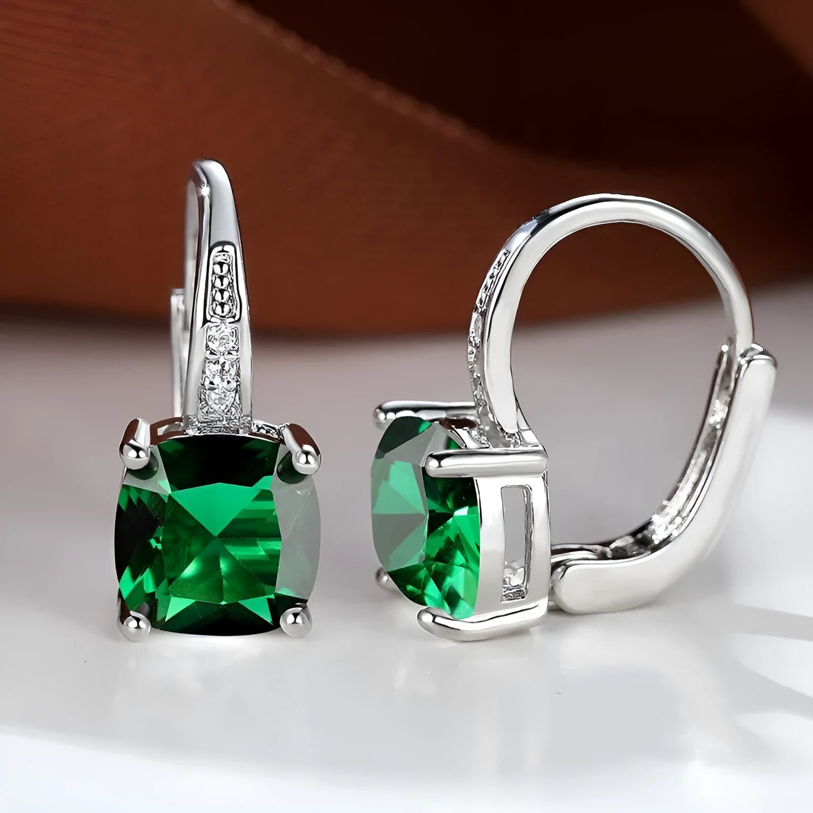 Square geometric zirconia ear hook earrings in a selection of gold, rose gold and platinum plated colours.
