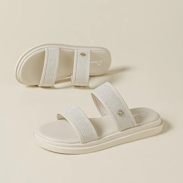 Women's vintage brown flip-flops with soft-bottom construction and retro design