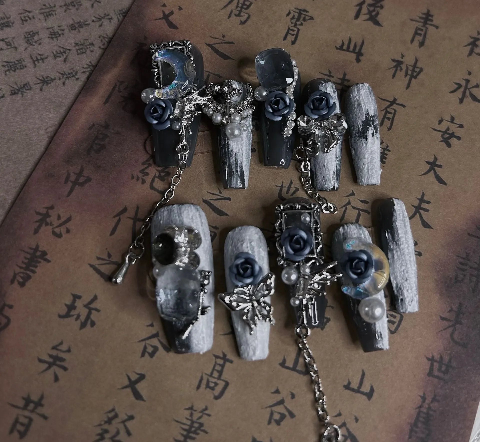 Heavy industry night blue manicure set with ornate rose design and plastic storage case.