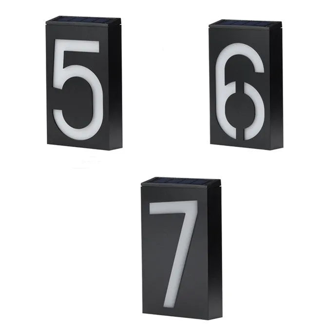 Solar powered house number light with LED illumination and waterproof housing for outdoor installation