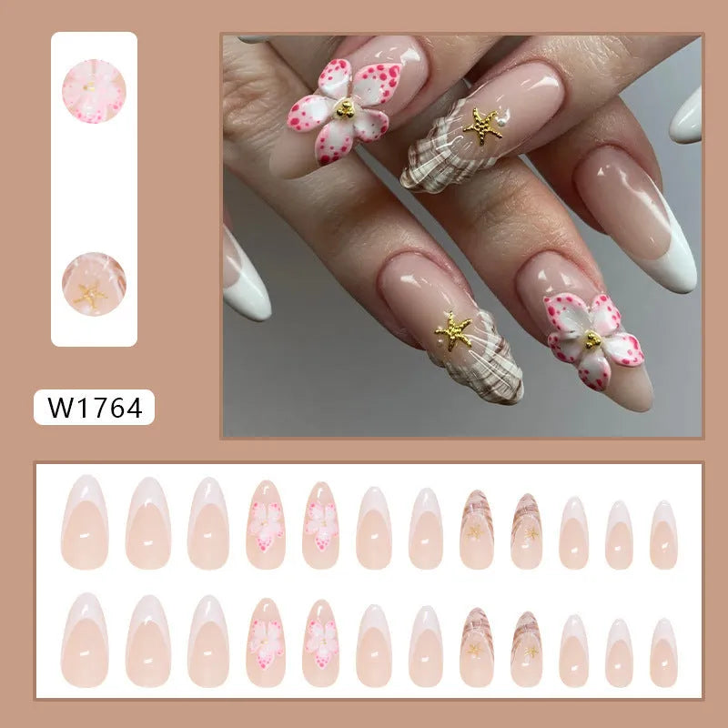 French style fake nails with rock pattern patches and simple flower design in plastic storage case
