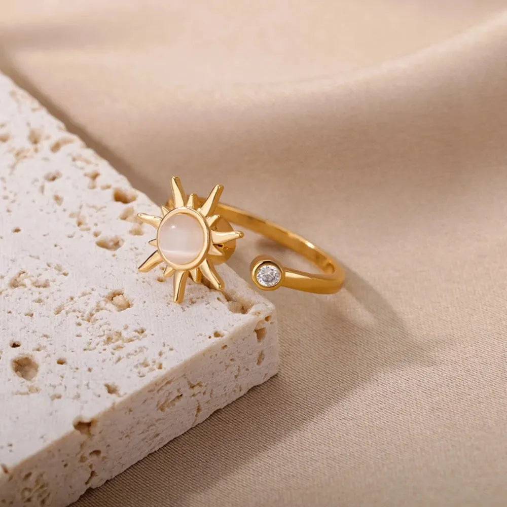 Copper rotatable decompression ring with adjustable opening in gold electroplated finish