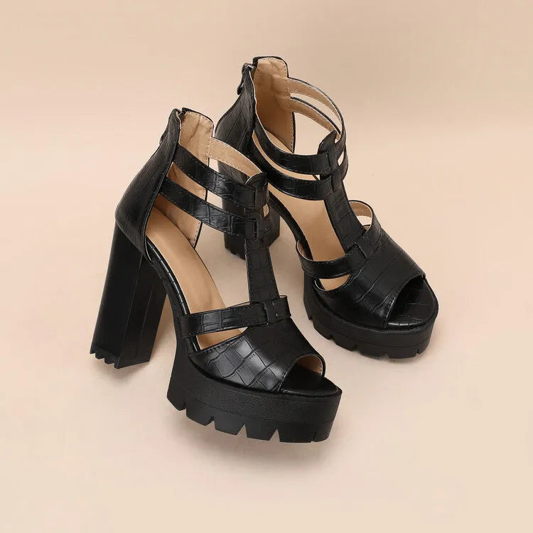 Women's black platform high heel sandals with ankle strap and back zipper on a round toe.