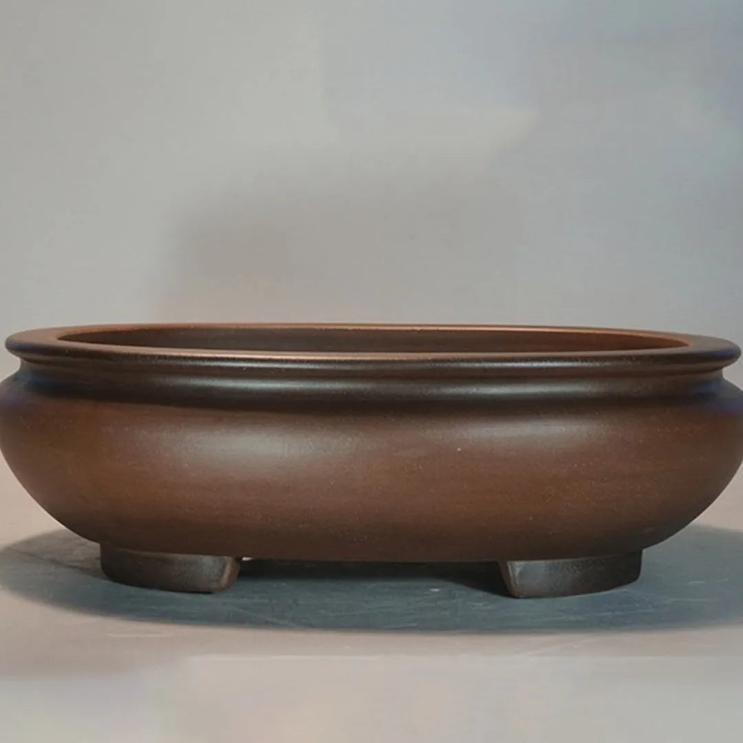 Handmade purple clay desktop flowerpot measuring 58cm long for indoor plant display