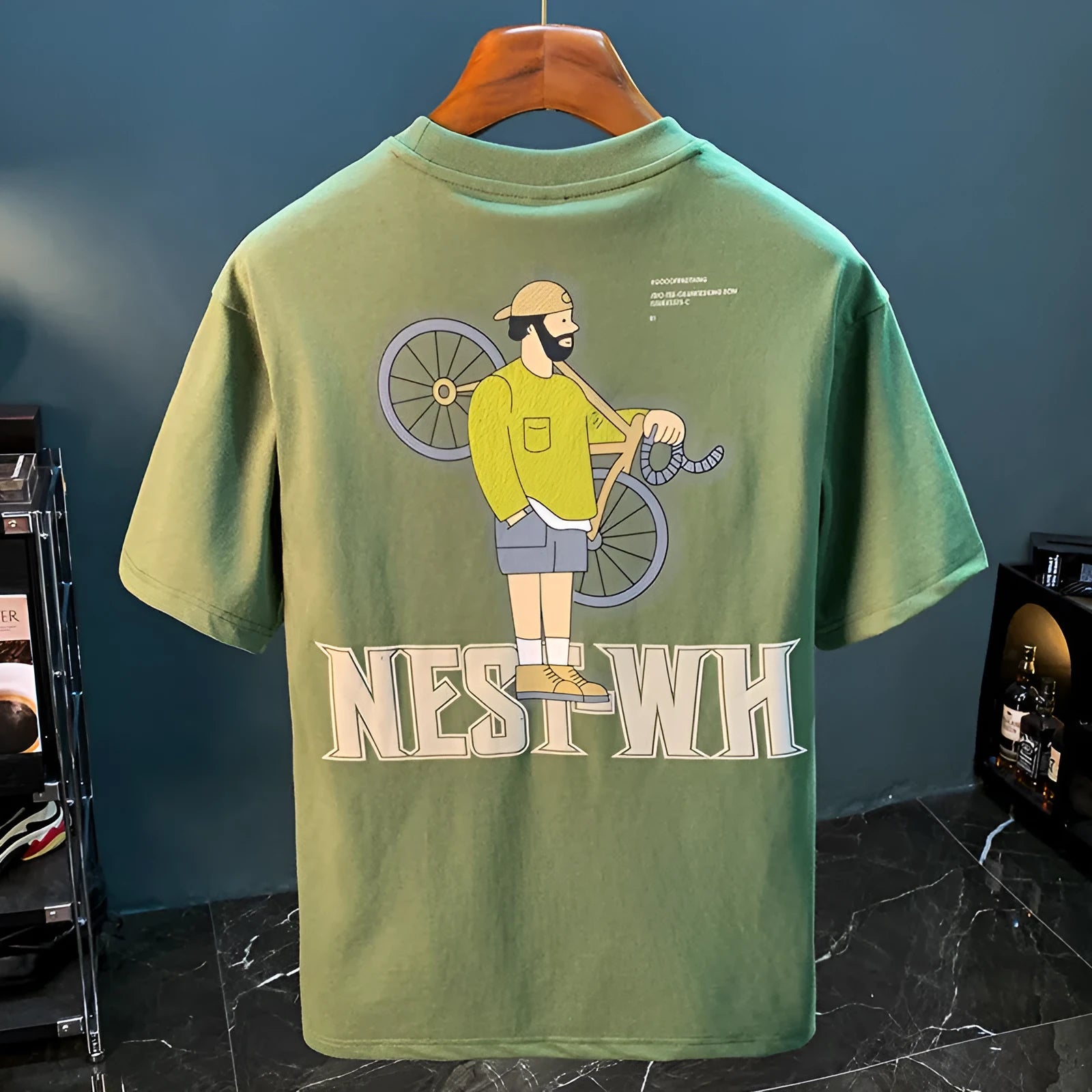 Green men's loose fit T-shirt with printed design and short sleeves for sports and casual wear