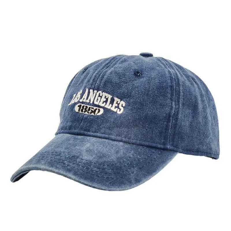 Personalised embroidered retro-style peaked cap in distressed beige with adjustable strap