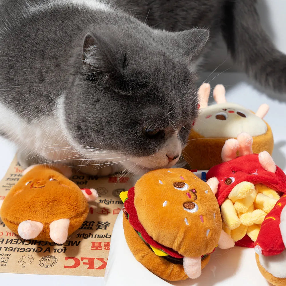 Set of five soft cat chewing toys shaped like bread, chicken legs, fries, a hamburger, and a hot dog.