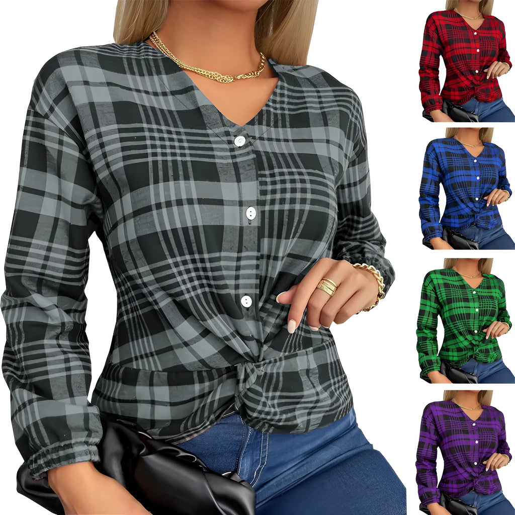 A woman wearing a loose-fitting purple plaid casual shirt with regular sleeves.