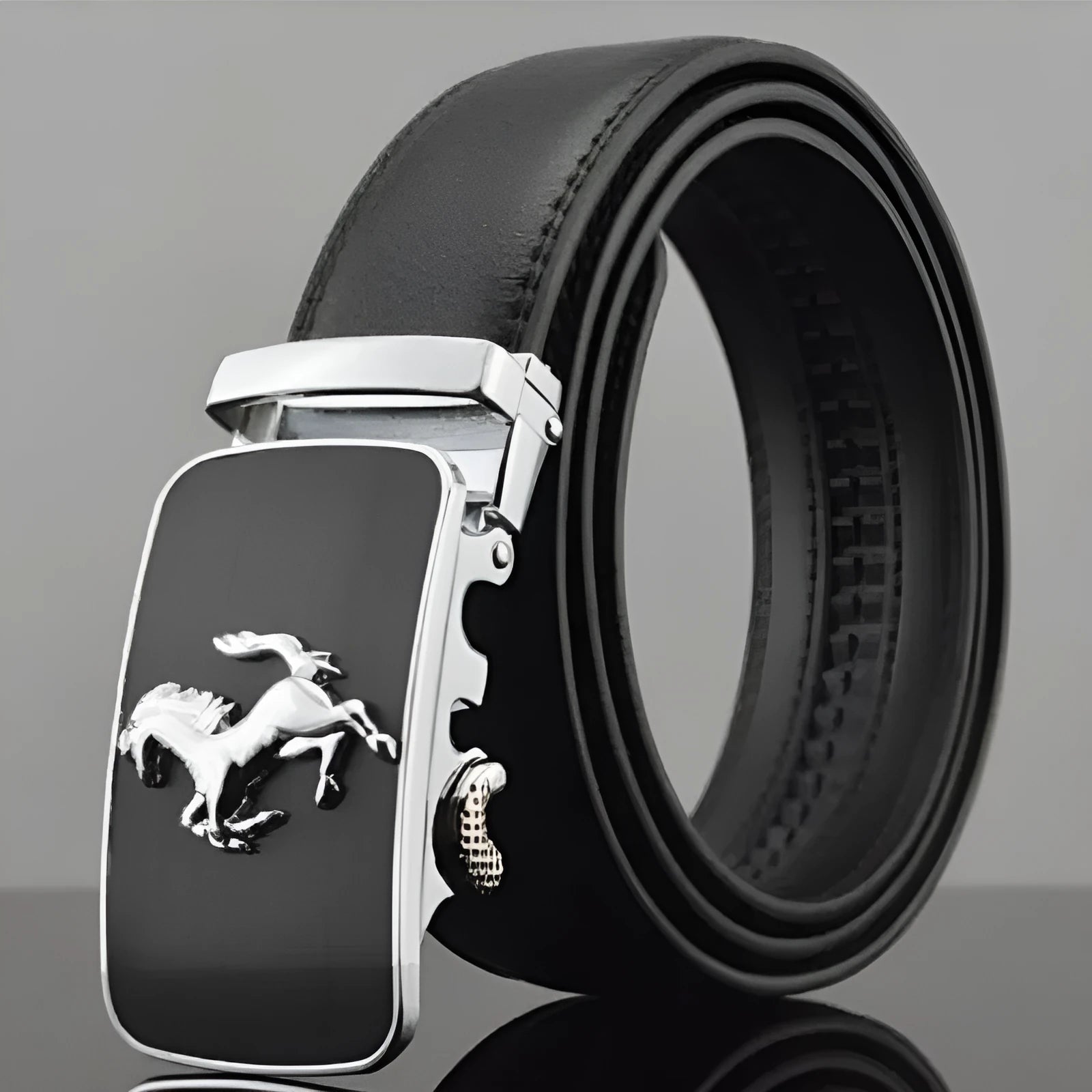 Men's black leather belt with automatic buckle, showing leopard print design and gun metal buckle.