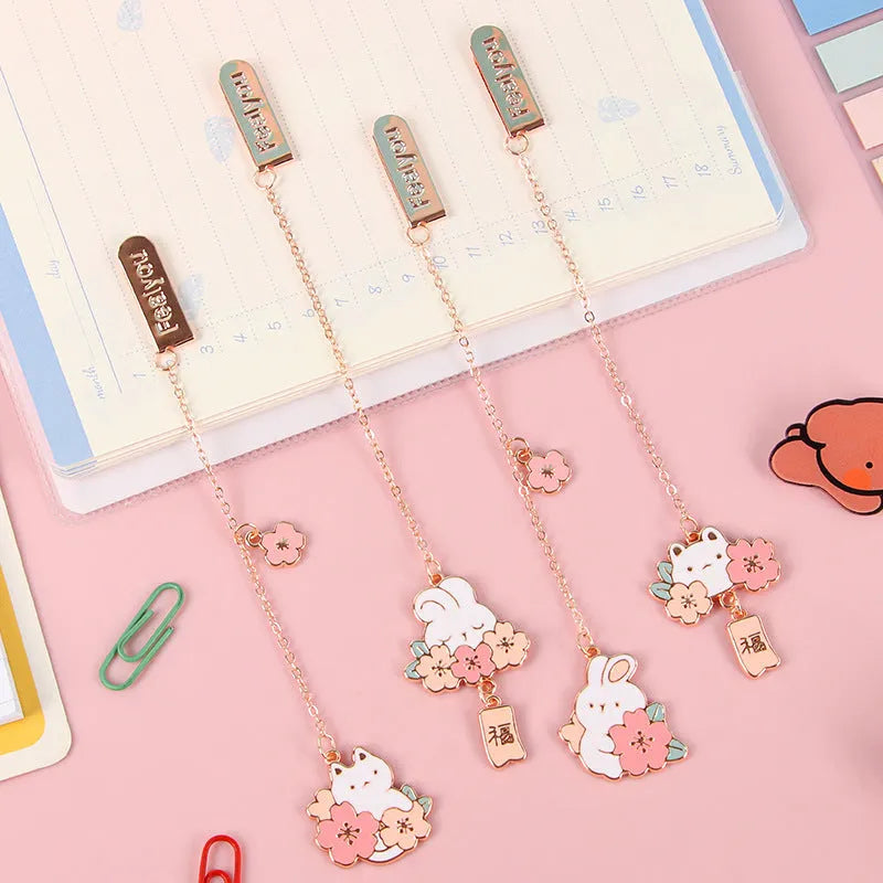 Metal pendant bookmark with cherry blossom cartoon cat design and matching book holder