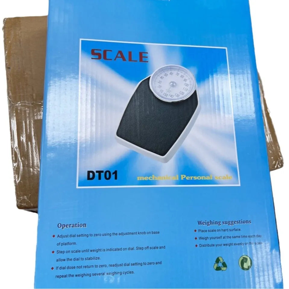 Black mechanical body weight scale with large dial and pointer on a simple platform.