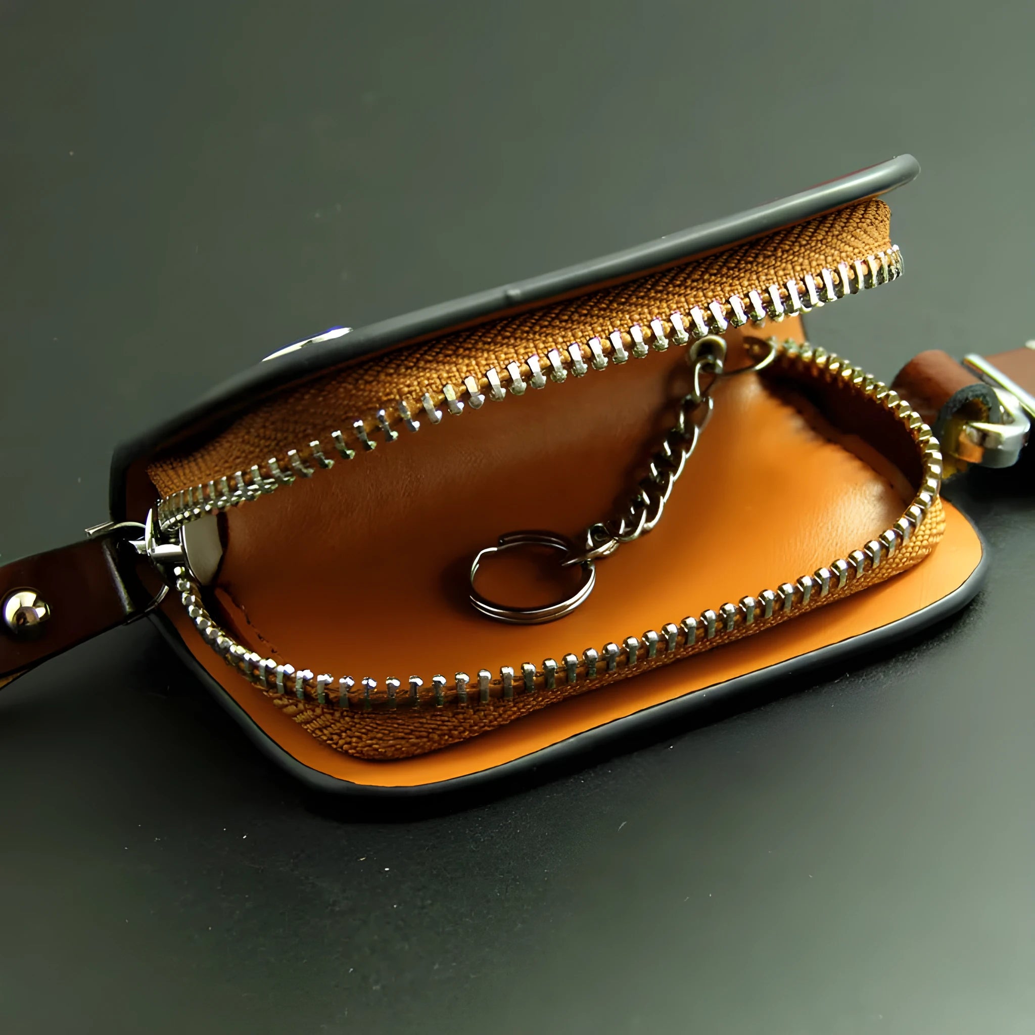Genuine leather car key case with frosted finish showing black and brown colour options
