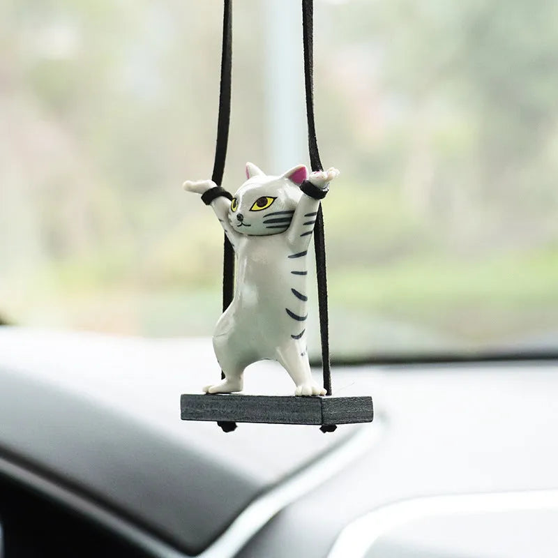 Cartoon resin cat pendant for car interior on a 25 cm adjustable rope, in black, white, flower, grey, or brown colour.