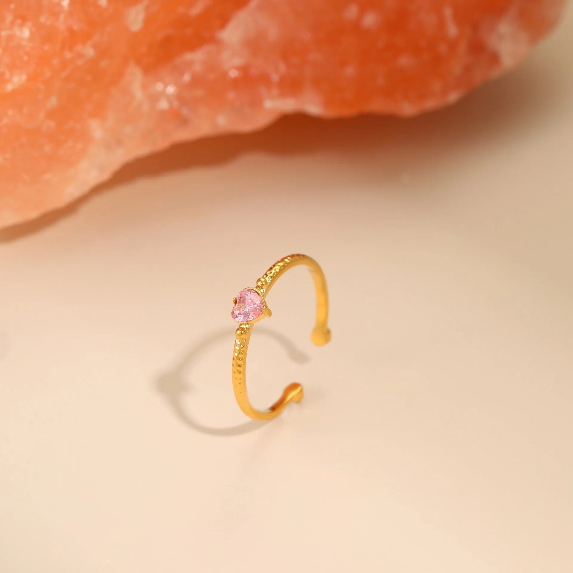 Open ended geometric stainless steel ring with a coloured zircon love heart inlay.