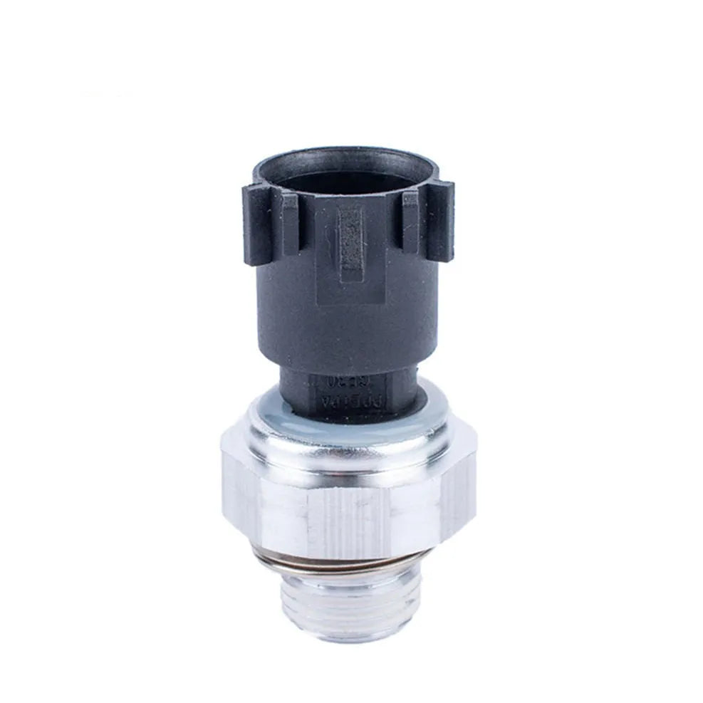 Silver automobile fuel pressure sensor with electrical connector for fuel system monitoring
