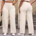 Women's apricot high-waist wide-leg straight jeans on a hanger