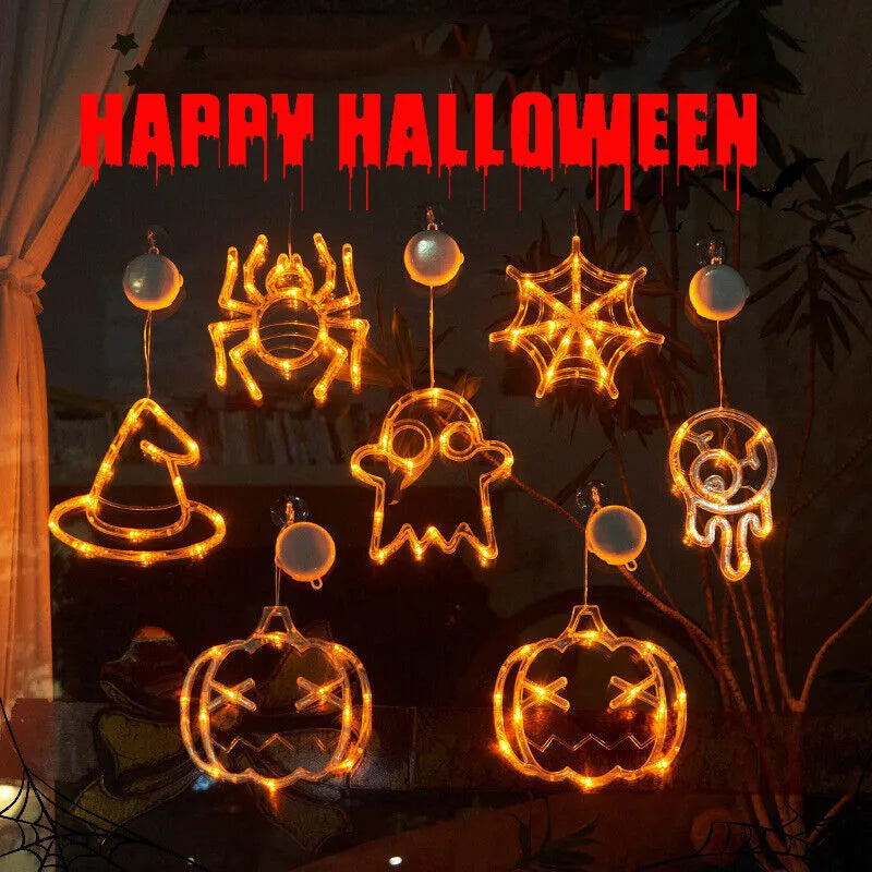 Seven Halloween-themed LED hanging lights with suction cups including spiders, pumpkins and ghosts