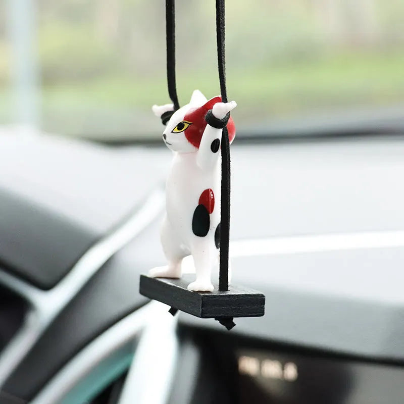 Cartoon resin cat pendant for car interior on a 25 cm adjustable rope, in black, white, flower, grey, or brown colour.