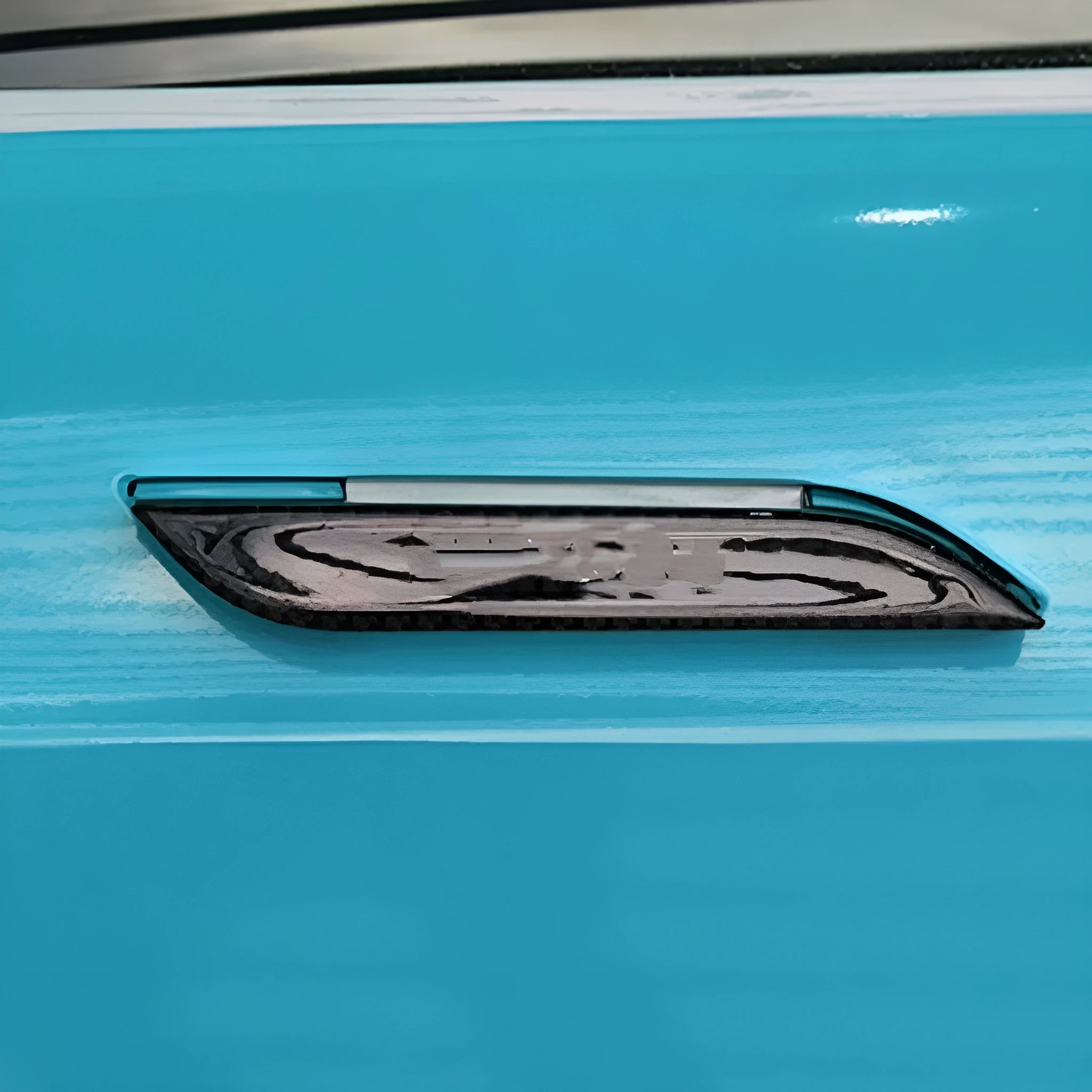 Carbon fibre door handle protective stickers for Tesla Model S, showing adhesive drip pattern.
