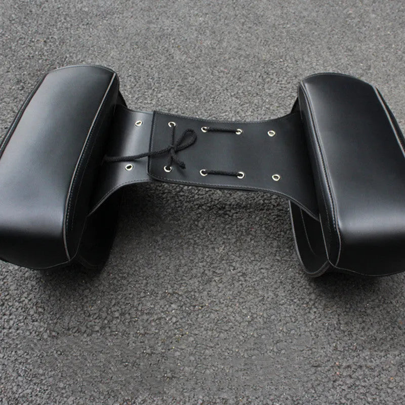 Retro style black PU leather motorcycle saddlebag side box mounted on a bike frame.