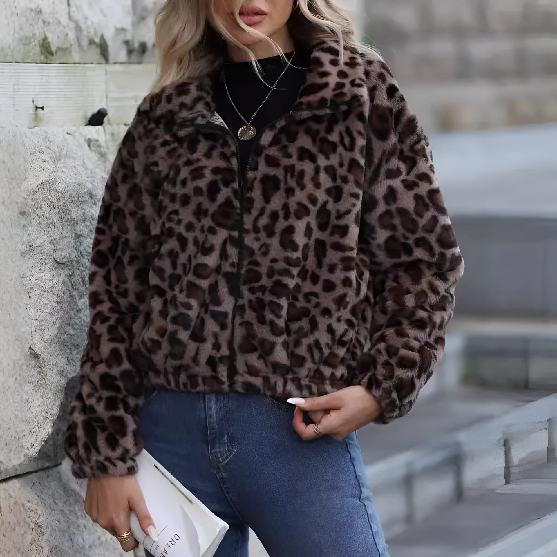 Women's loose leopard print plush coat with zipper and raglan sleeves on a hanger