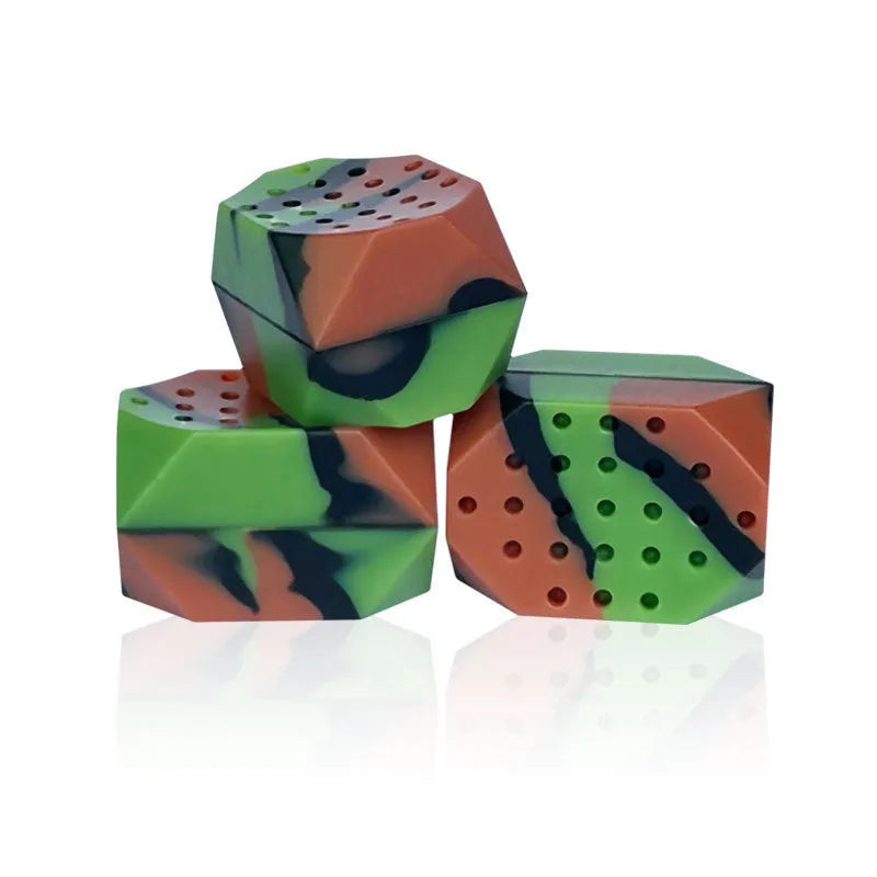 Two camouflage pattern silicone facial exercise balls for jaw training in transparent box