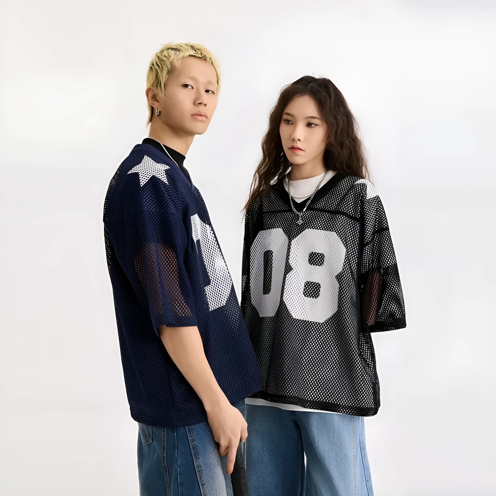 Black and navy blue half sleeve pullover shirt with loose fit and letter pattern detail