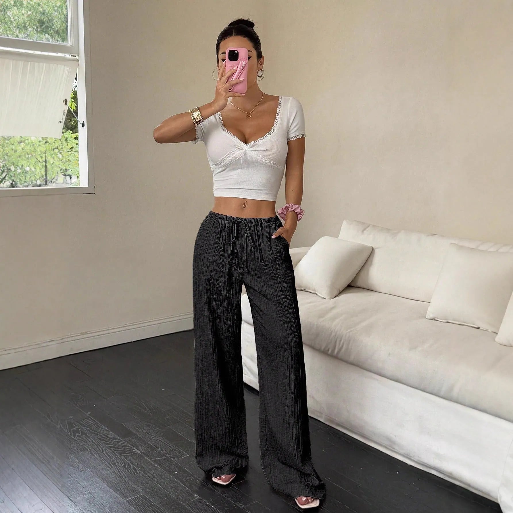 Women's black wide-leg trousers with lace-up waist detail