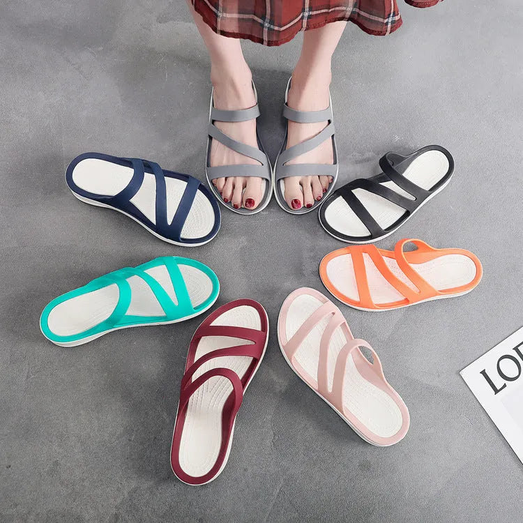 Women's solid colour summer sandals with a breathable PP upper and flat sole.